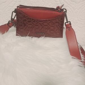 Calvin Klein Embossed Crossbody Bag in Deep Red